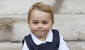 LONDON, ENGLAND - DECEMBER 13: (Getty Images provides access to this publicly distributed image for editorial use only and is not the copyright owner. No Sales - No Commercial Use) In this handout image of three released on December 13, 2014 by Kensington Palace, Prince George sits for his official Christmas picture in a courtyard at Kensington Palace in late November of 2014 in London, England. (Photo by The Duke and Duchess of Cambridge/PA Wire via Getty Images)