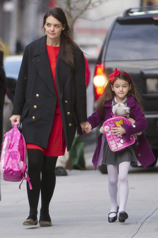 January 3, 2013: Suri Cruise takes her Hello Kitty backpack along as she walks to school in New York City this morning with mom, Katie Holmes. Mandatory Credit: Elder Ordonez/INFphoto.com Ref: infusny-160|sp|